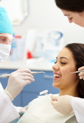 dentist-examining-patient-s-teeth.jpg